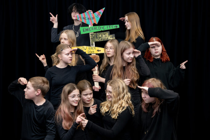 Young actors with the sign